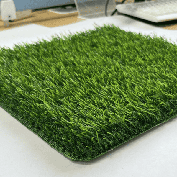 artificial grass tiles with vibrant green color and natural looking surface ideal for indoor and outdoor use