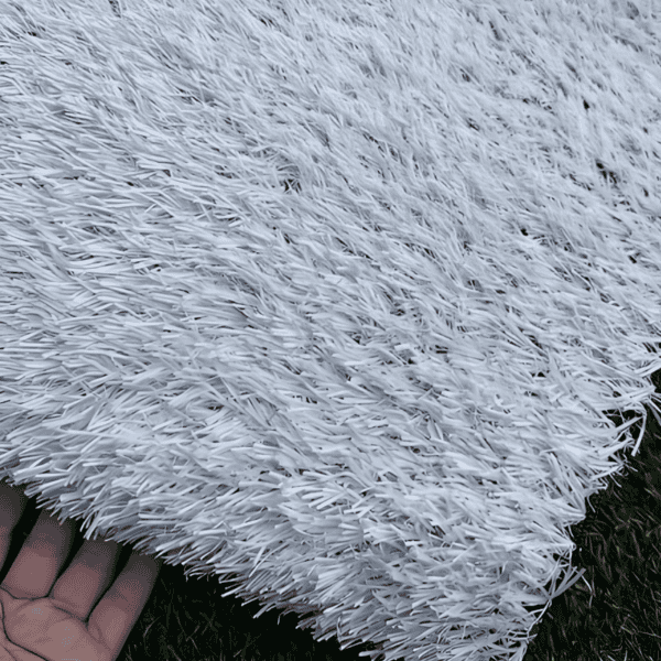close-up of white artificial grass sample with detailed texture