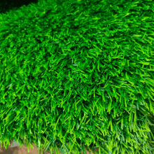 Commercial 2 close-up view of commercial artificial grass roll showing vibrant green fibers and durable backing for high-traffic areas