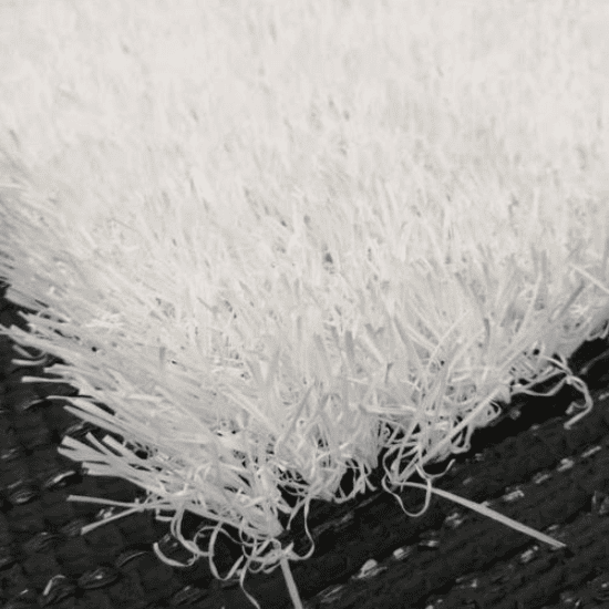 close-up view of white artificial grass showing fine synthetic fibers