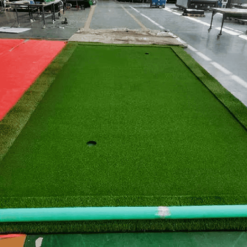 Indoor 11 indoor golf practice mat with tees and golf balls on synthetic turf for home golf training