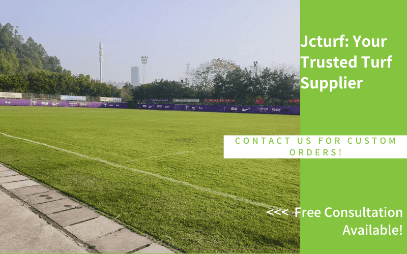 Football field with artificial grass goal post visible