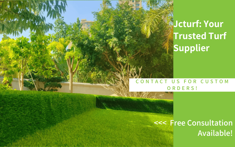 artificial grass used for landscaping with clean edges and surrounding greenery