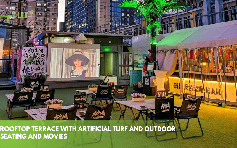 23 Inspiring Fake Grass Patio Ideas for a Beautiful, Low-Maintenance Patio 8 outdoor cinema setup with artificial grass flooring and folding chairs for a movie night under the stars