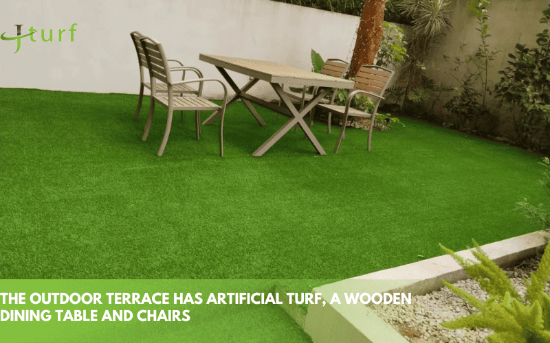 23 Inspiring Fake Grass Patio Ideas for a Beautiful, Low-Maintenance Patio 4 outdoor patio with synthetic grass and wooden dining table and chairs for comfortable seating