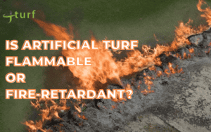 Artificial grass catching fire during flammability test on outdoor surface