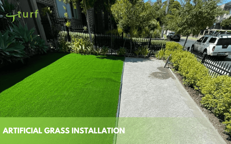 Artificial grass installation in front yard with clear turf and gravel contrast