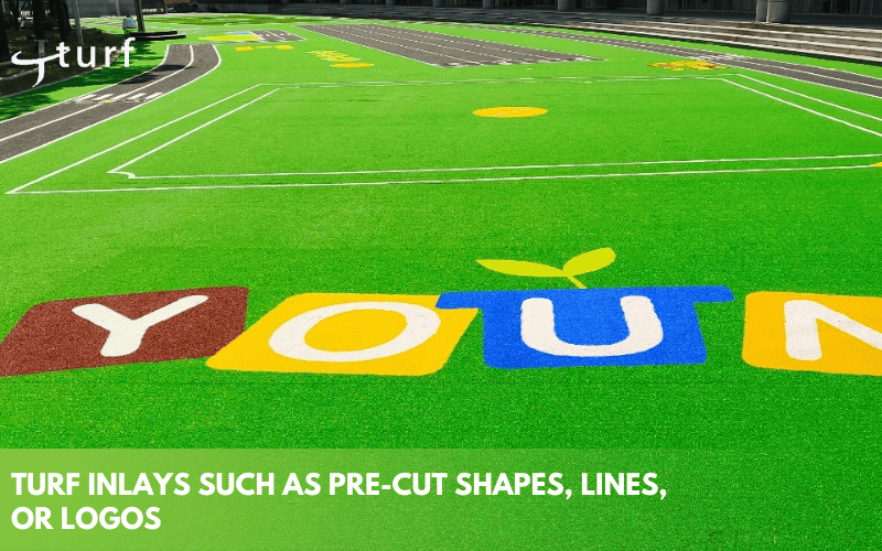 ¿Se puede pintar el césped artificial? Una guía completa sobre lo que funciona 2 Incrustación de césped artificial con letras y diseños precortados de colores en el patio de la escuela.