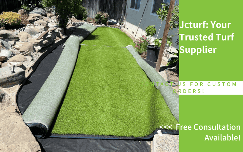 rolled turf being installed along narrow side yard in home garden landscape