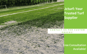 artificial grass field with visible turf sand and patchy infill areas