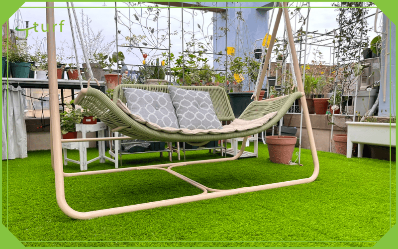 artificial grass for rooftop use with outdoor swing setup