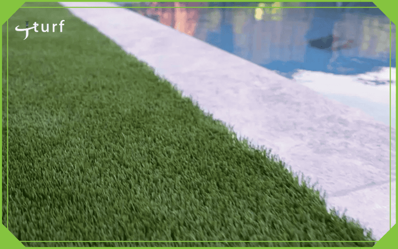 artificial grass installed beside swimming pool edge