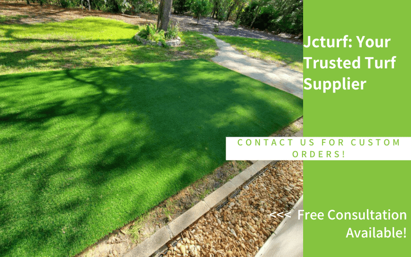 artificial grass next to real lawn in residential yard