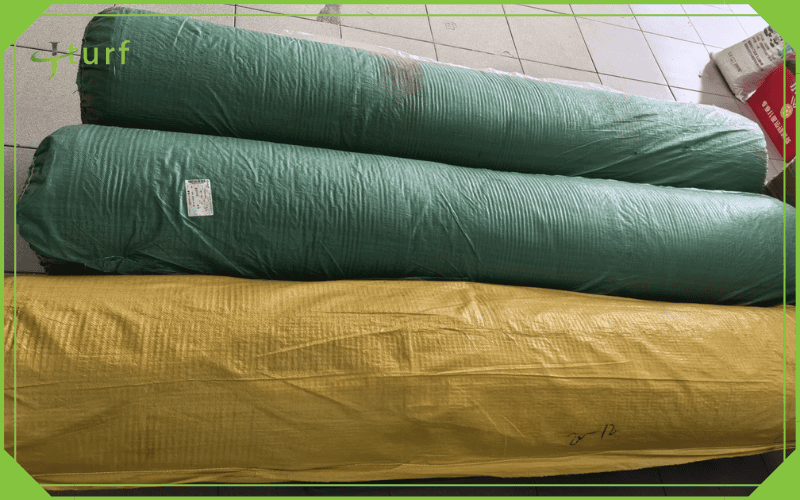 artificial turf rolls wrapped in protective packaging for transport