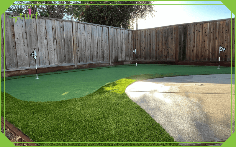 backyard putting green with artificial grass and flag markers