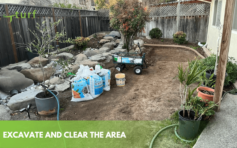 cleared backyard surface prepared for artificial turf