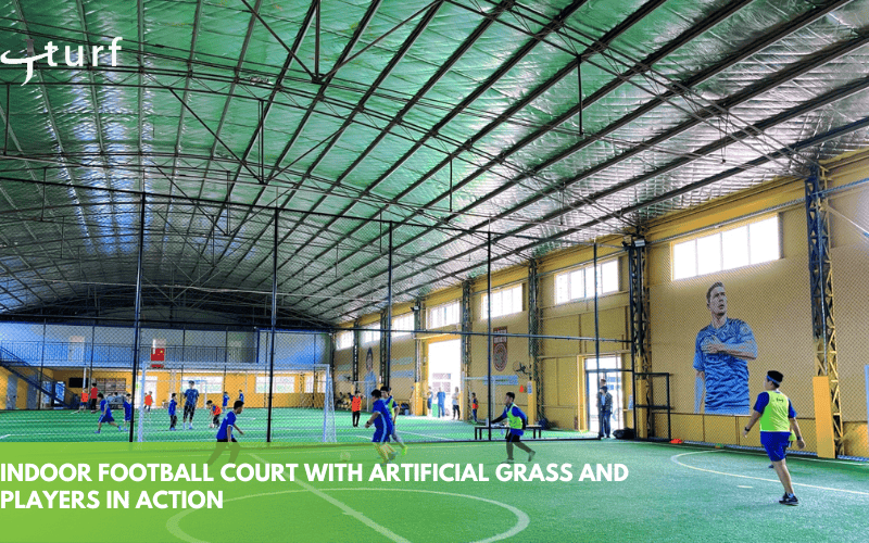 indoor football court with artificial grass and players in action
