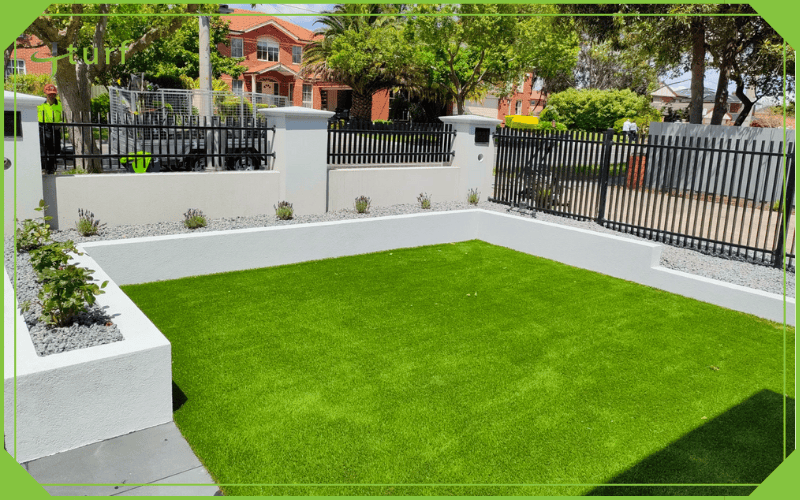 residential courtyard with installed artificial grass lawn