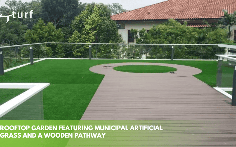 rooftop garden featuring municipal artificial grass and a wooden pathway