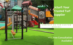A colorful playground with slides, climbing structures, and swings on a grassy turf surface, under a clear sky.