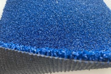 detailed close-up of blue padel artificial grass durable synthetic turf with low maintenance for sports use