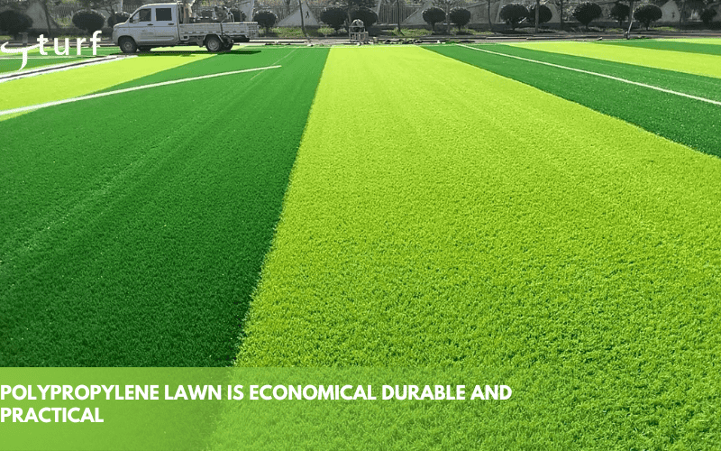 Vibrant green artificial turf with varying shades, showing a well-maintained outdoor space.
